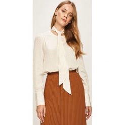 Tommy Hilfiger - Bluzka. Białe bluzki damskie TOMMY HILFIGER, bez wzorów, z wiskozy, z okrągłym kołnierzem, z długim rękawem. W wyprzedaży za 399,90 zł.