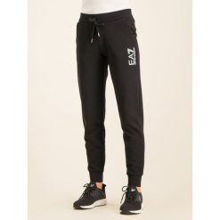 Spodnie dresowe EA7 Emporio Armani 6GTP56 TJ27Z 1200. Czarne spodnie damskie EA7 Emporio Armani, m, z elastanu. W wyprzedaży za 259,00 zł.