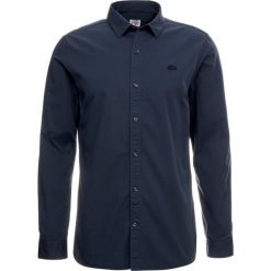 Lacoste LIVE Koszula meridian blue. Niebieskie koszule męskie marki Lacoste LIVE, m, z bawełny. Za 379,00 zł.
