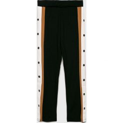 Lmtd - Spodnie dziecięce 140-176 cm. Czerwone spodnie dziewczęce LMTD, bez wzorów, z elastanu, casualowe. W wyprzedaży za 119,90 zł.