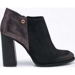 Carinii - Botki. Czarne buty zimowe damskie marki Carinii, z materiału, z okrągłym noskiem, na obcasie. W wyprzedaży za 219,90 zł.
