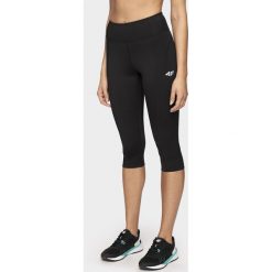 Legginsy treningowe damskie. Spodnie damskie 4f, bez wzorów, z dzianiny. Za 79,99 zł.