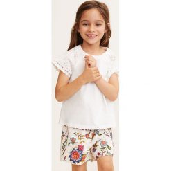 Mango Kids - Szorty dziecięce 110-164 cm. Spodenki dziewczęce Mango Kids, bez wzorów, z bawełny, casualowe. W wyprzedaży za 39,90 zł.