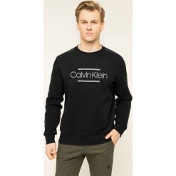 Bluza Calvin Klein Mix Media Logo K10K104948. Czarne bluzy męskie Calvin Klein, m, bez wzorów, z elastanu, bez kołnierzyka, bez rękawów, bez kaptura. W wyprzedaży za 259,00 zł.