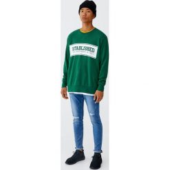 Średnioniebieskie jeansy skinny fit. Niebieskie jeansy męskie marki Pull&Bear, m, bez wzorów. Za 139,00 zł.