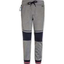 Spodnie chłopięce: Retour Jeans ABEL Spodnie treningowe light grey melange