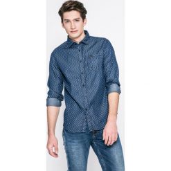 Guess Jeans - Koszula Clyde. Niebieskie koszule męskie Guess Jeans, xl, z aplikacjami, z bawełny, casualowe, z włoskim kołnierzykiem, z długim rękawem. W wyprzedaży za 269,90 zł.