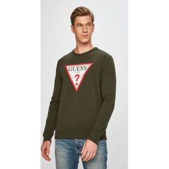 Guess Jeans - Bluza. Czerwone bluzy męskie s, z nadrukiem, z elastanu, z okrągłym kołnierzem. W wyprzedaży za 219,90 zł.