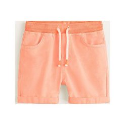 Mango Kids - Szorty dziecięce Moon 110-164 cm. Pomarańczowe spodenki chłopięce Mango Kids, bez wzorów, z bawełny, casualowe. W wyprzedaży za 59,90 zł.