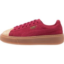 Puma Tenisówki i Trampki red. Czerwone trampki chłopięce marki Puma, z materiału, na sznurówki. W wyprzedaży za 200,85 zł.