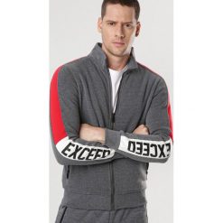 Ciemnoszara Bluza Thelliphis. Szare bluzy męskie Born2be, xl, bez wzorów, bez kołnierzyka, bez rękawów, bez kaptura. Za 89,99 zł.