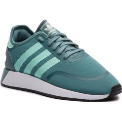 Buty adidas - N-5923 W B37989 Rawgrn/Clemin/Cblack. Zielone buty sportowe damskie Adidas, bez wzorów, z tworzywa sztucznego, sportowe. W wyprzedaży za 269,00 zł.