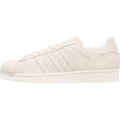 Adidas Originals SUPERSTAR Tenisówki i Trampki clear brown. Brązowe tenisówki damskie adidas Originals, z materiału. W wyprzedaży za 239,40 zł.