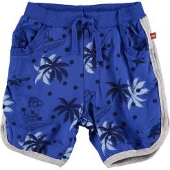 Szorty "Ping 301" w kolorze niebieskim. Niebieskie spodenki chłopięce marki LEGO Wear, z nadrukiem, z bawełny. W wyprzedaży za 72,95 zł.