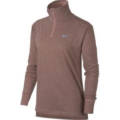 Bluzka Nike Therma-Sphere Half-Zip Top W Szaro-Różowa. Szare topy damskie Nike, na zimę, bez wzorów, bez rękawów, bez kaptura, do biegania. Za 179,99 zł.