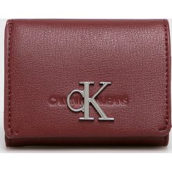 Calvin Klein Jeans - Portfel. Czarne portfele damskie Calvin Klein Jeans, bez wzorów, z jeansu. W wyprzedaży za 199,90 zł.