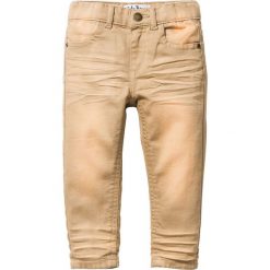 Spodnie Skinny bonprix cappuccino. Brązowe spodnie chłopięce marki bonprix, z bawełny. Za 44,99 zł.