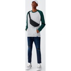 Jeansy carrot fit z suwakami. Czarne jeansy męskie relaxed fit marki Pull&Bear, m. Za 139,00 zł.