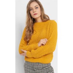 Sweter z widocznym splotem. Żółte swetry klasyczne damskie Orsay, s, z dzianiny. Za 99,99 zł.
