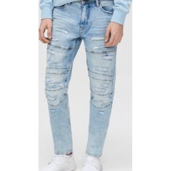 Jeansy slim - Niebieski. Niebieskie jeansy męskie Cropp, m, bez wzorów. Za 119,99 zł.