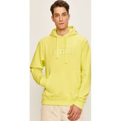 Tommy Hilfiger - Bluza x Lewis Hamilton. Żółte bluzy męskie TOMMY HILFIGER, s, z aplikacjami, z bawełny, z kapturem, bez rękawów, z kapturem. W wyprzedaży za 499,90 zł.