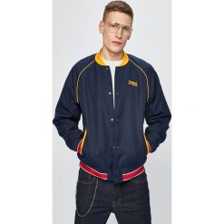 Tommy Jeans - Kurtka bomber. Niebieskie płaszcze męskie marki Tommy Jeans, s, bez wzorów, z elastanu, krótkie, bez kaptura. Za 849,90 zł.