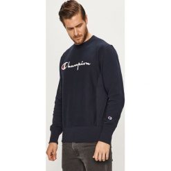 Champion - Bluza. Niebieskie bluzy męskie Champion, s, z aplikacjami, z bawełny, z okrągłym kołnierzem, bez rękawów, bez kaptura. W wyprzedaży za 219,90 zł.