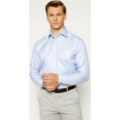 Koszula Eton 316979511. Niebieskie koszule męskie Eton, m, bez wzorów, z bawełny, biznesowe, bez kołnierzyka, bez rękawów. W wyprzedaży za 399,00 zł.