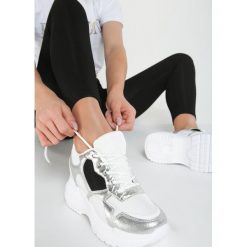 Białe Sneakersy Suzanna. Białe koturny damskie Renee, z okrągłym noskiem, bez obcasa, na koturnie, na sznurówki. Za 119,99 zł.