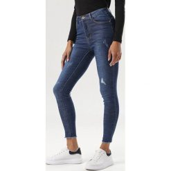 Granatowe Jeansy Skinny Galiniassi. Niebieskie jeansy damskie Born2be, bez wzorów, z jeansu. Za 99,99 zł.