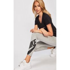 Nike Sportswear - Legginsy. Szare spodnie damskie Nike Sportswear, s, z nadrukiem, z elastanu. W wyprzedaży za 99,90 zł.