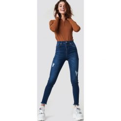 NA-KD Skinny Twisted Jeans - Blue. Niebieskie jeansy damskie skinny marki NA-KD, z denimu, z podwyższonym stanem. Za 141,95 zł.
