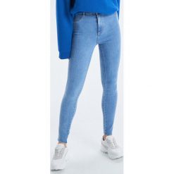 Jeansy Skinny z lampasem - Niebieski. Niebieskie jeansy damskie marki Cropp. Za 79,99 zł.
