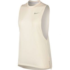 Koszulka Nike Dri-Fit Tailwind Tank W Pudrowa. Bluzki sportowe damskie Nike, bez wzorów, bez kołnierzyka, bez rękawów, bez kaptura, do biegania, dri-fit (nike). Za 94,99 zł.
