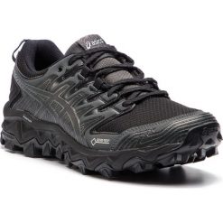 Buty ASICS - Gel-FujiTrabuco 7 G-TX GORE-TEX 1012A190 Black/Dark Grey 001. Czarne buty sportowe damskie Asics, bez wzorów, ze skóry ekologicznej, sportowe, do biegania, gore-tex. W wyprzedaży za 389,00 zł.