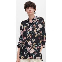 Koszula oversize w kwiaty -. Koszule damskie Reserved, w kwiaty, bez kołnierzyka, bez rękawów. Za 89,99 zł.