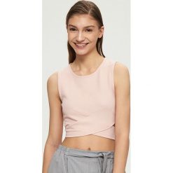 Topy damskie: Top z wycięciami w talii – Różowy