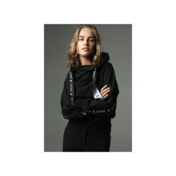 Bluza Go Sky High - grafitowa. Szare bluzy damskie marki Madnezz, s, z aplikacjami, z elastanu, bez rękawów, bez kaptura. Za 299,00 zł.