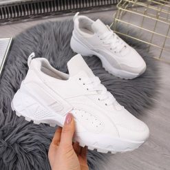Buty sportowe damskie wysoka podeszwa białe McKeylor - biały. Białe buty sportowe damskie McKeylor, bez wzorów, sportowe. Za 99,99 zł.