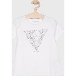 Guess Jeans - Top 118-175 cm. Białe bluzki dziewczęce Guess Jeans, z aplikacjami, z elastanu, z okrągłym kołnierzem, z krótkim rękawem, krótkie, bez kaptura. W wyprzedaży za 79,90 zł.