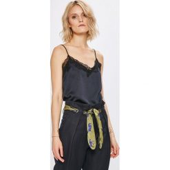 Only - Top Happy. Niebieskie topy damskie marki ONLY, z poliesteru. W wyprzedaży za 49,90 zł.