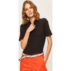 Tommy Hilfiger - T-shirt. Niebieskie bluzki damskie TOMMY HILFIGER, s, bez wzorów, z elastanu, z okrągłym kołnierzem, z krótkim rękawem. W wyprzedaży za 219,90 zł.