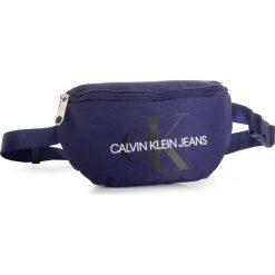 Saszetka nerka CALVIN KLEIN JEANS - Monogram Waist Pack IU0IU00089 C88. Niebieskie saszetki damskie Calvin Klein Jeans, bez wzorów, z jeansu, młodzieżowe, bez dodatków. Za 179,00 zł.