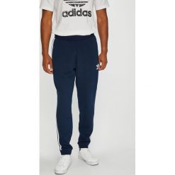 Adidas Originals - Spodnie. Niebieskie spodnie męskie adidas Originals, xl, bez wzorów, z elastanu, sportowe. W wyprzedaży za 219,90 zł.