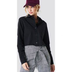 Koszule jeansowe damskie: NA-KD Trend Koszula jeansowa z surowym brzegiem - Black