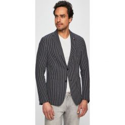Tommy Hilfiger Tailored - Marynarka. Niebieskie garnitury męskie Tommy Hilfiger Tailored, bez wzorów, z elastanu, casualowe. W wyprzedaży za 699,90 zł.