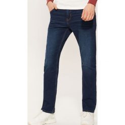 Jeansy regular classic - Granatowy. Niebieskie jeansy męskie regular marki House. Za 129,99 zł.