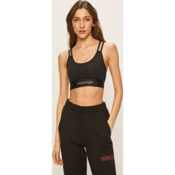 Calvin Klein Performance - Biustonosz sportowy. Czarne biustonosze sportowe damskie Calvin Klein Performance, s, bez wzorów, z elastanu. Za 249,90 zł.