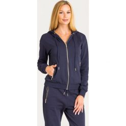 BLUZA ARMANI EXCHANGE. Niebieskie bluzy damskie Armani Exchange, s, bez wzorów, z bawełny, bez rękawów, z kapturem. Za 609,00 zł.