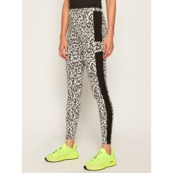 Legginsy Puma Classics Graphics 597734. Brązowe spodnie damskie Puma, xl, bez wzorów. Za 159,99 zł.